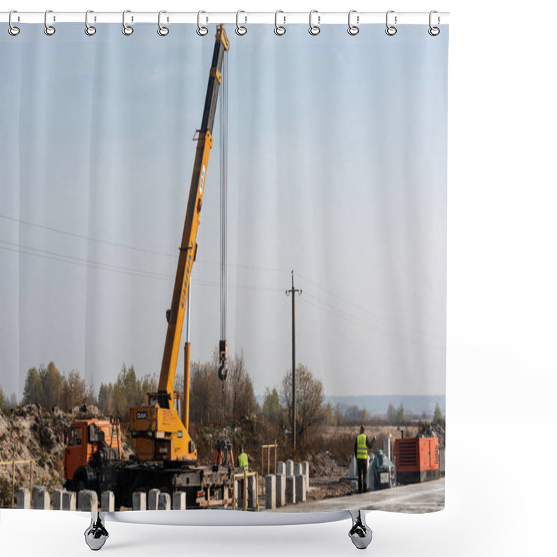 Personality  LVIV, UKRAINE - OCTOBER 23, 2019: Truck And Crane With Dak Lettering And Cyrillic Inscription, And Concrete Blocks Near Workers On Highway Shower Curtains