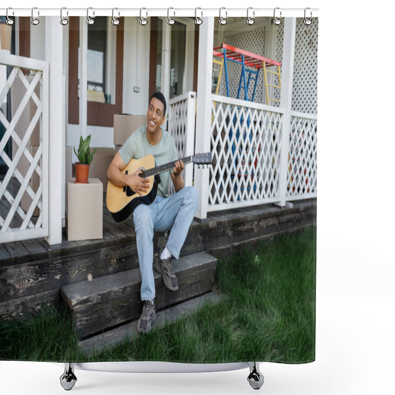 Personality  Joyful African American Man Playing Acoustic Guitar On Porch Near Carton Boxes And New House Shower Curtains