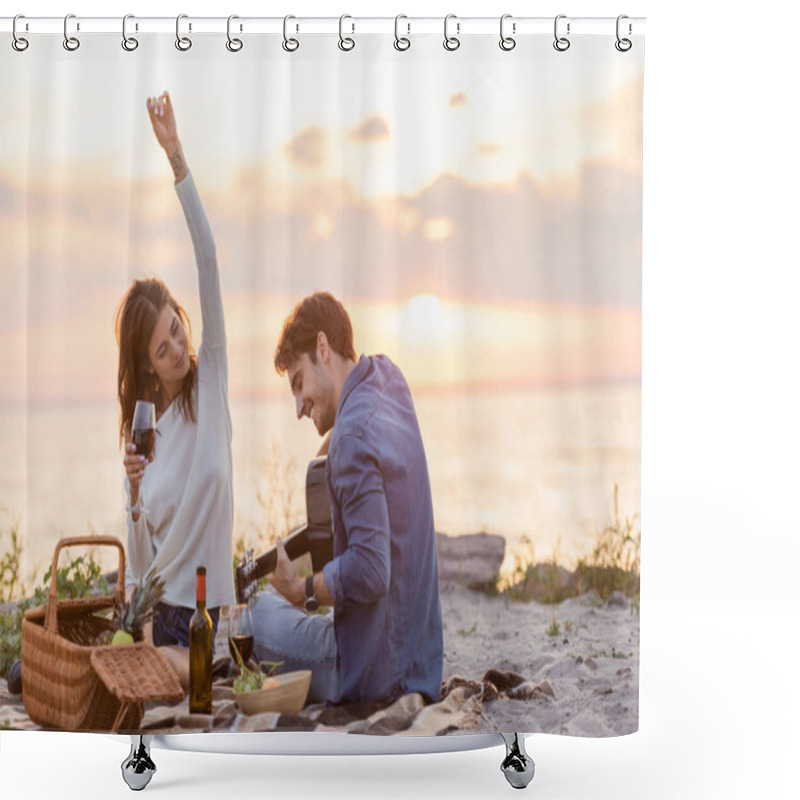 Personality  Selective Focus Of Woman Holding Glass Of Wine Near Boyfriend Playing Acoustic Guitar During Picnic On Beach  Shower Curtains