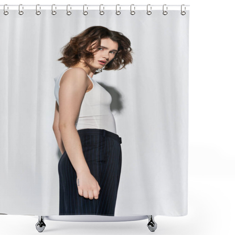 Personality  A Young, Pretty Woman Poses Elegantly In A White Tank Top And Black Pants Against A Grey Studio Backdrop. Shower Curtains