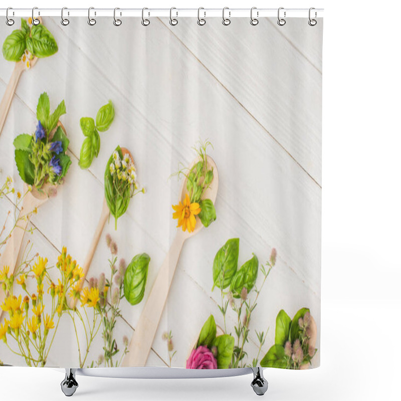 Personality  Top View Of Herbs And Green Leaves In Spoons Near Flowers On White Wooden Background, Naturopathy Concept Shower Curtains