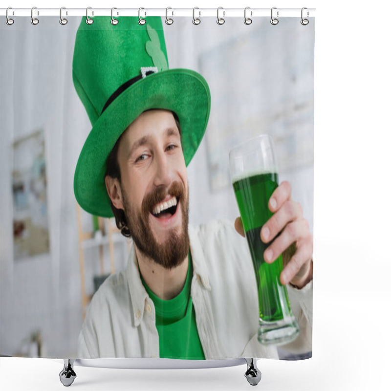 Personality  Cheerful Man In Saint Patrick Hat Holding Green Beer And Looking At Camera At Home  Shower Curtains