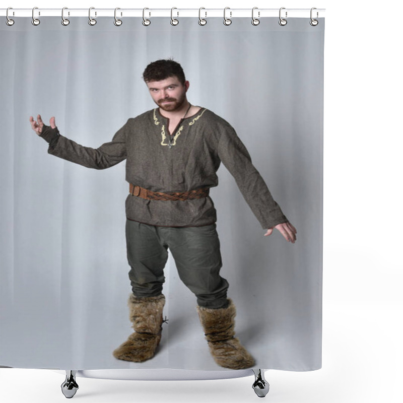 Personality  Full Length  Portrait Of  Young Handsome Man  Wearing  Medieval Celtic Adventurer Costume.  Standing Pose Isolated On Studio Background. Shower Curtains