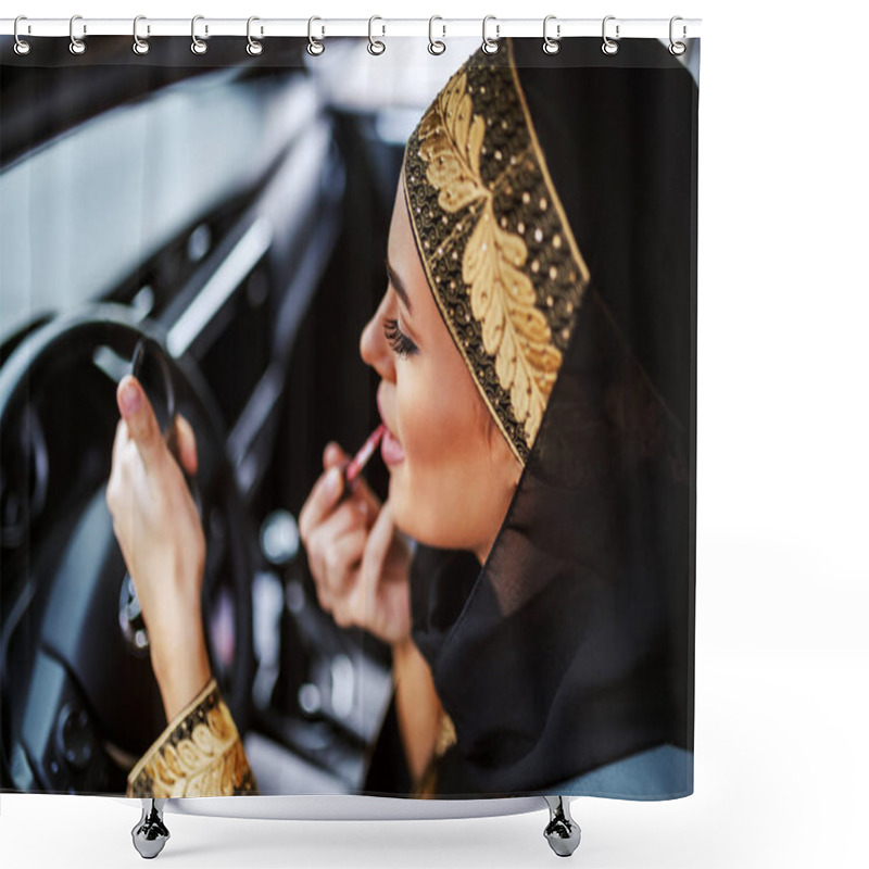 Personality  Gorgeous Attractive Young Muslim Woman In Traditional Wear Sitting In Her Car During Traffic Jam And Putting On Lipstick. Shower Curtains