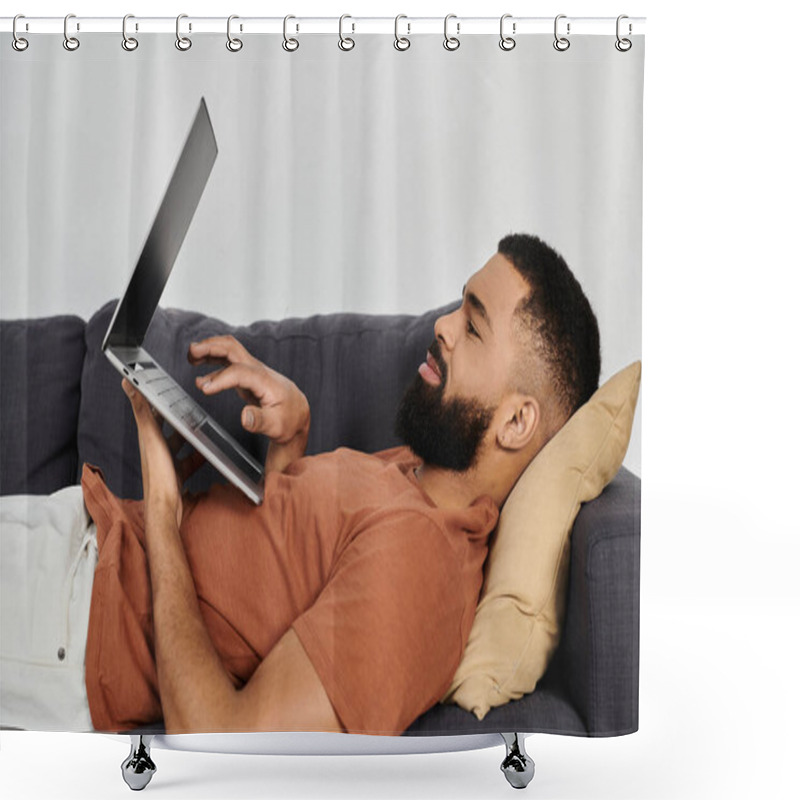 Personality  A Handsome Man Enjoys Leisure Time While Using His Laptop At Home. Shower Curtains