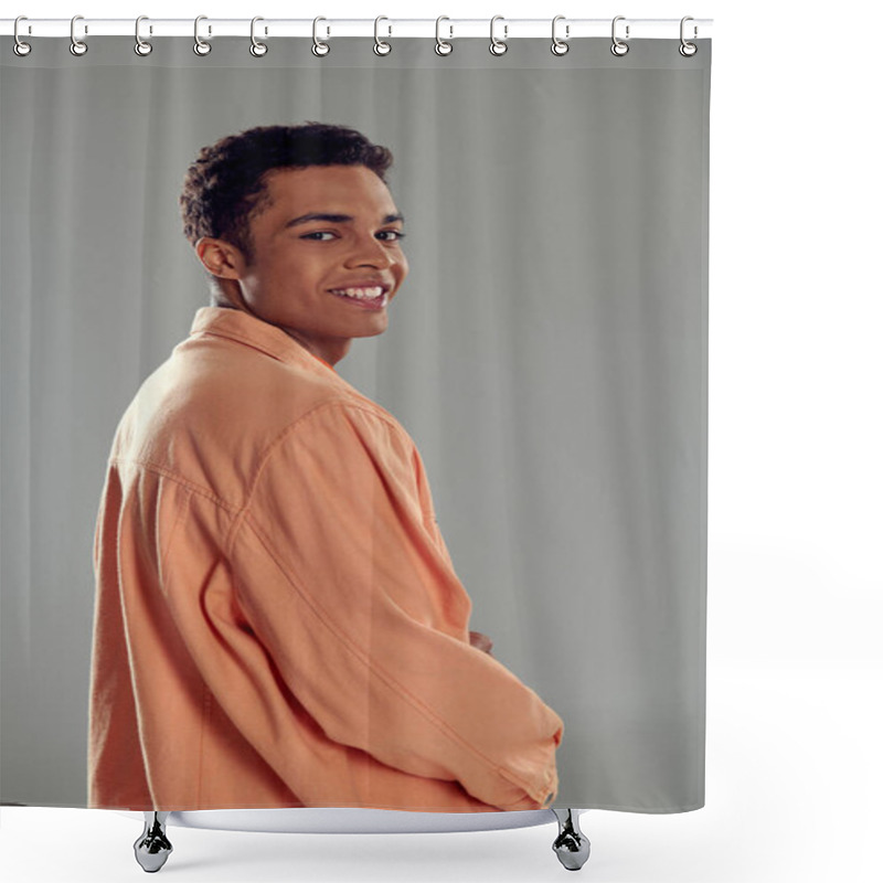 Personality  Happy Man In Peach Shirt Standing Against Grey Wall, Showcasing His Impeccable Fashion Sense Shower Curtains