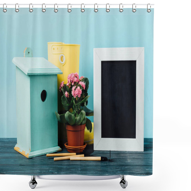 Personality  Close Up View Of Kalanchoe In Flowerpot, Rubber Boots, Birdhouse, Gardening Equipment And Empty Blackboard On Wooden Tabletop On Blue Shower Curtains