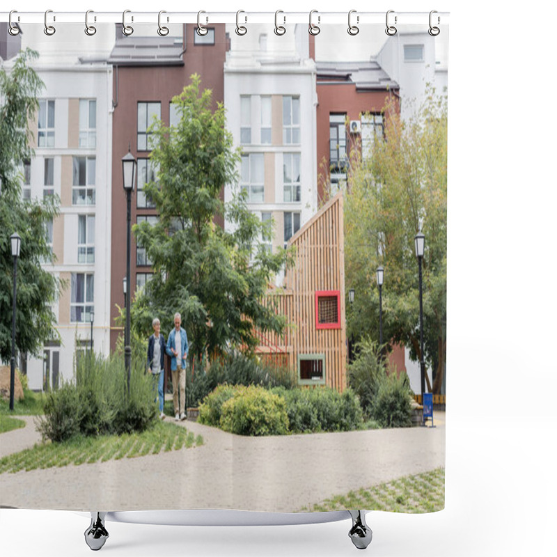 Personality  Mature Man And Woman Walking Near New Buildings Outside  Shower Curtains