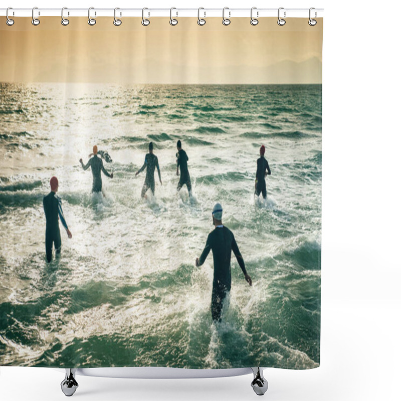 Personality  Athletic Swimmers Entering The Water With Their Wetsuits On. Competitors In Wet Suits Running Into The Water At The Start Of A Triathlon Shower Curtains