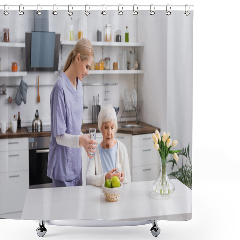 Personality  Young Nurse Giving Glass Of Water To Elderly Woman Holding Pills Container In Kitchen Shower Curtains