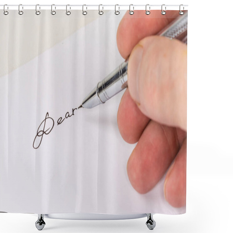 Personality  Modern Metal Fountain Pen In Hand Above The White Paper Sheet With Word Salutation 