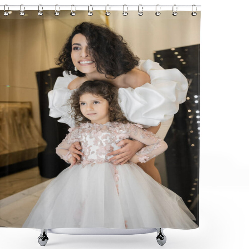 Personality  Gorgeous Middle Eastern Bride With Brunette Hair Standing In White Wedding Dress With Puff Sleeves And Ruffles Behind Cute Daughter And Smiling Together In Bridal Store, Looking Away  Shower Curtains