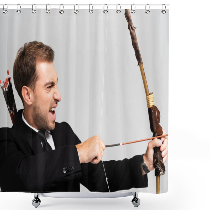 Personality  Side View Of Angry Businessman In Suit Holding Bow And Shooting With Arrow Isolated On Grey Shower Curtains