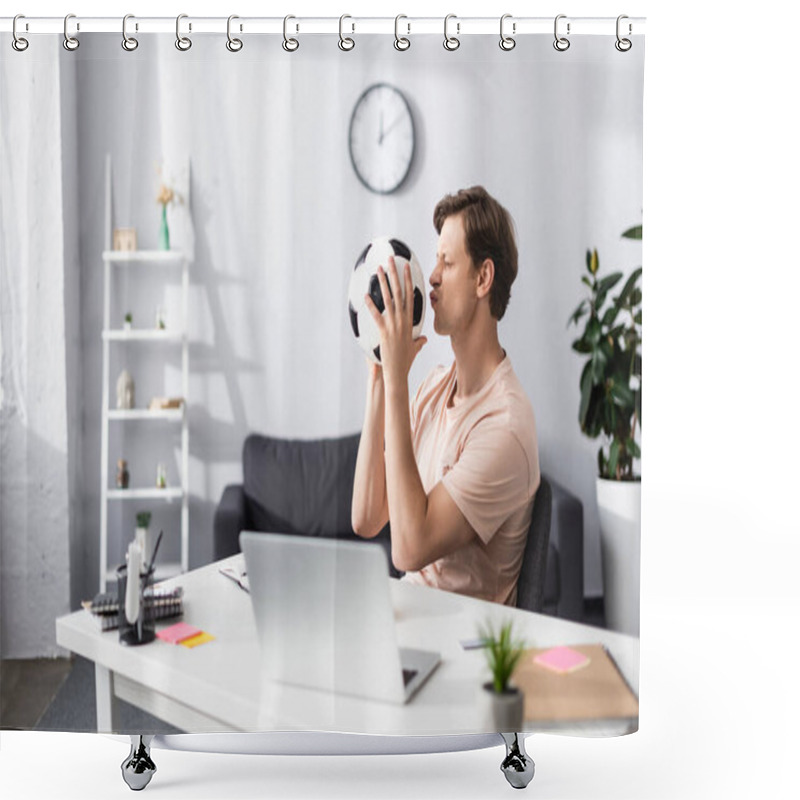 Personality  Selective Focus Of Man Kissing Football While Sitting Near Laptop And Stationery On Table At Home, Concept Of Earning Online Shower Curtains