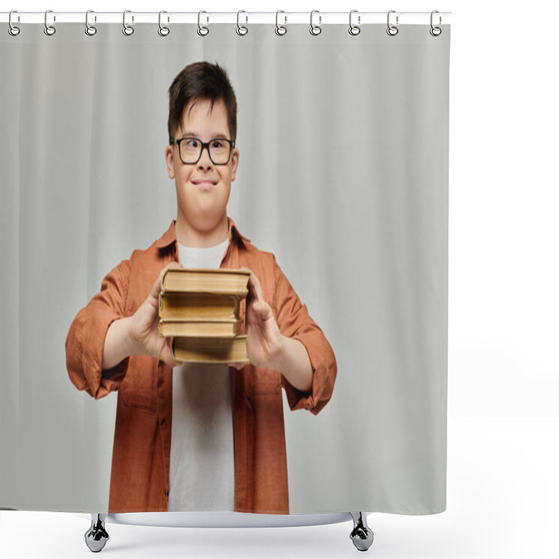 Personality  A Boy With Down Syndrome Happily Holds A Stack Of Books On A Gray Background. Shower Curtains