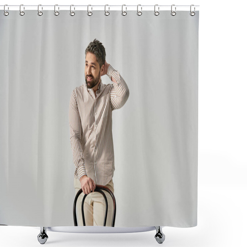 Personality  A Stylish Man With A Beard Sitting Confidently On Top Of A Chair Against A Grey Background In A Studio Setting. Shower Curtains