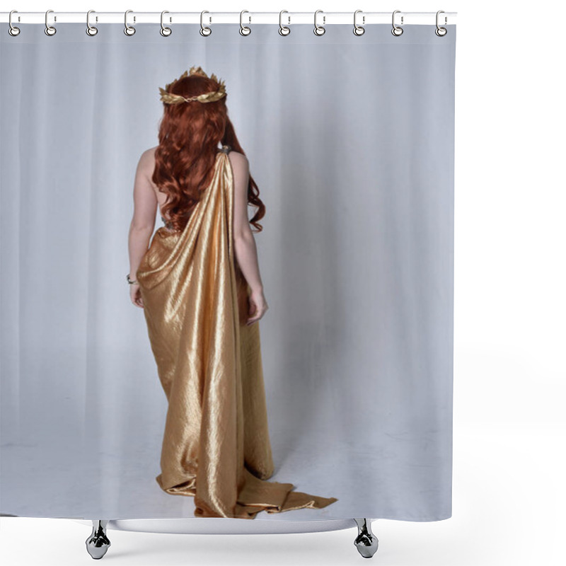 Personality  Full Length Portrait Of Girl With Red Hair Wearing Long Grecian Toga And Golden Wreath. Standing Pose With Back To The Camera,  Isolated Against A Grey Studio Background. Shower Curtains