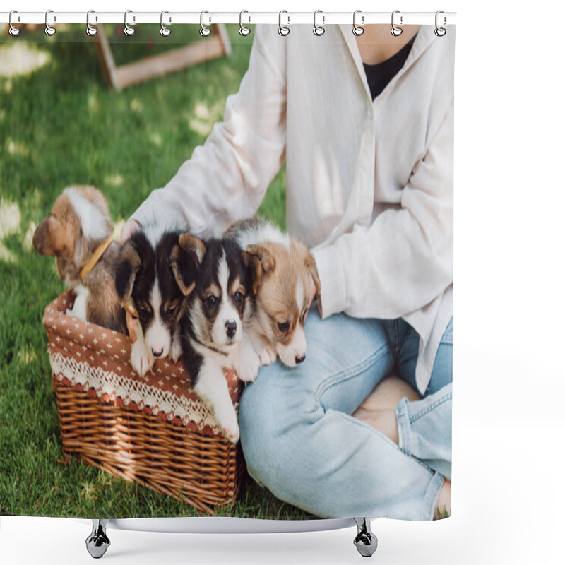 Personality  Cropped View Of Girl Sitting In Green Garden With Crossed Legs Near Wicker Box With Adorable Puppies Shower Curtains