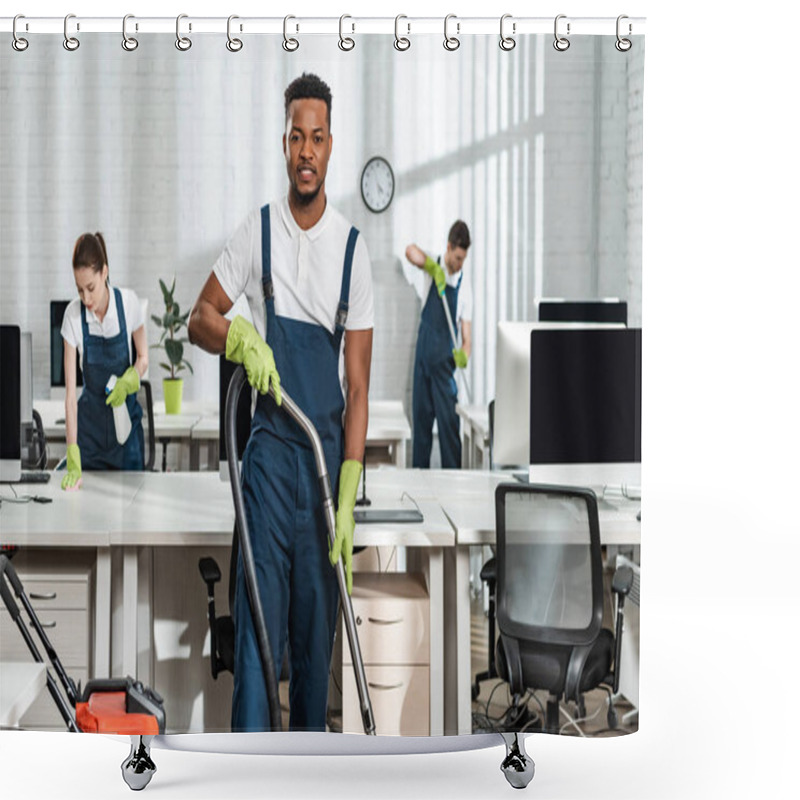 Personality  Handsome African American Cleaner Looking At Camera While Standing With Vacuum Cleaner Near Colleagues Shower Curtains