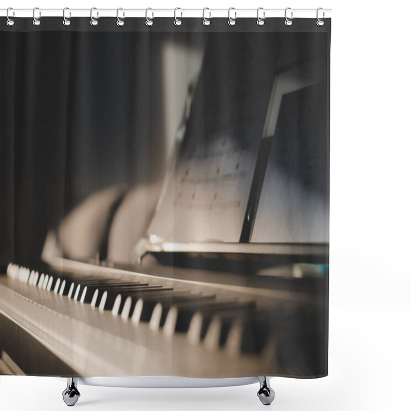 Personality  Low Shot Of 88 Keys Of A Keyboard And Sheet Music. Close Up With Light From Side Shower Curtains