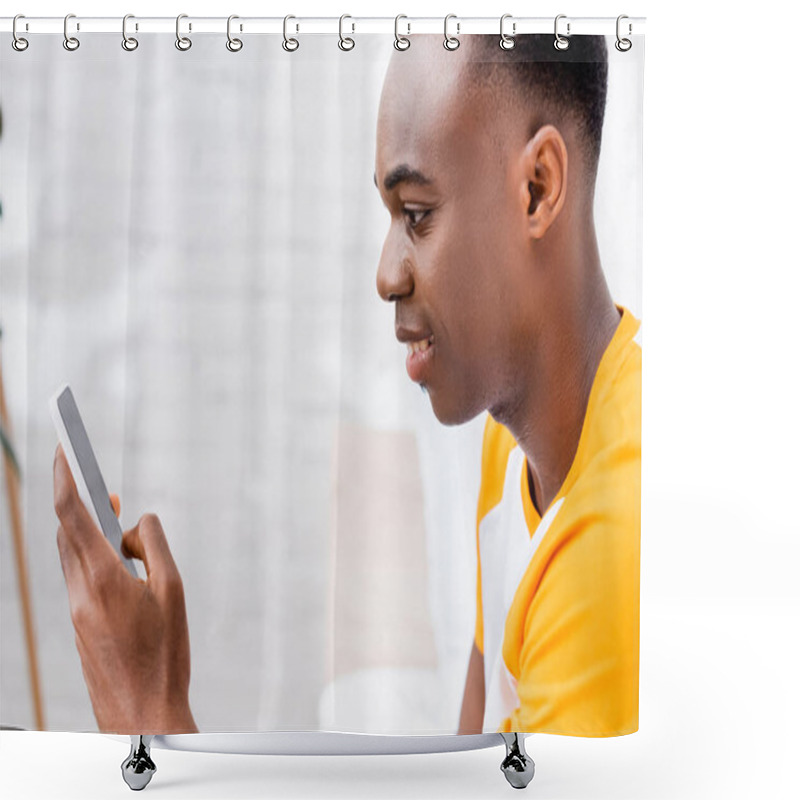 Personality  Smiling African American Man Using Smartphone With Blank Screen At Home  Shower Curtains