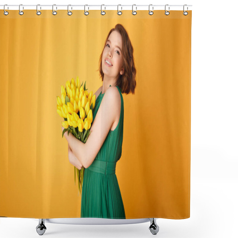 Personality  Side View Of Beautiful Woman With Bouquet Of Yellow Tulips Looking At Camera Isolated On Orange Shower Curtains