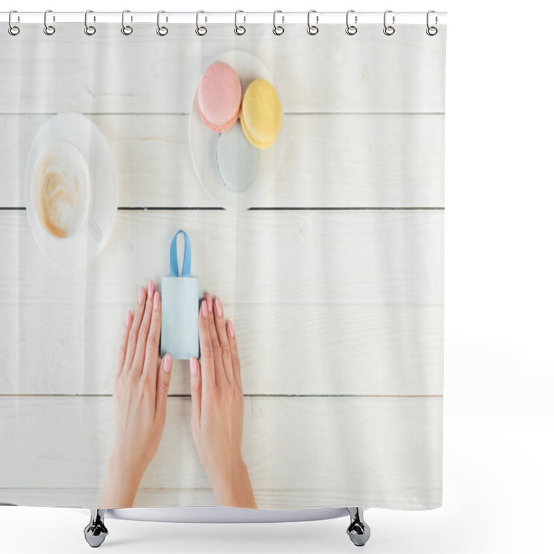 Personality  Top View Of Woman Holding Small Shopping Bag Near Macaroons And Coffee Shower Curtains