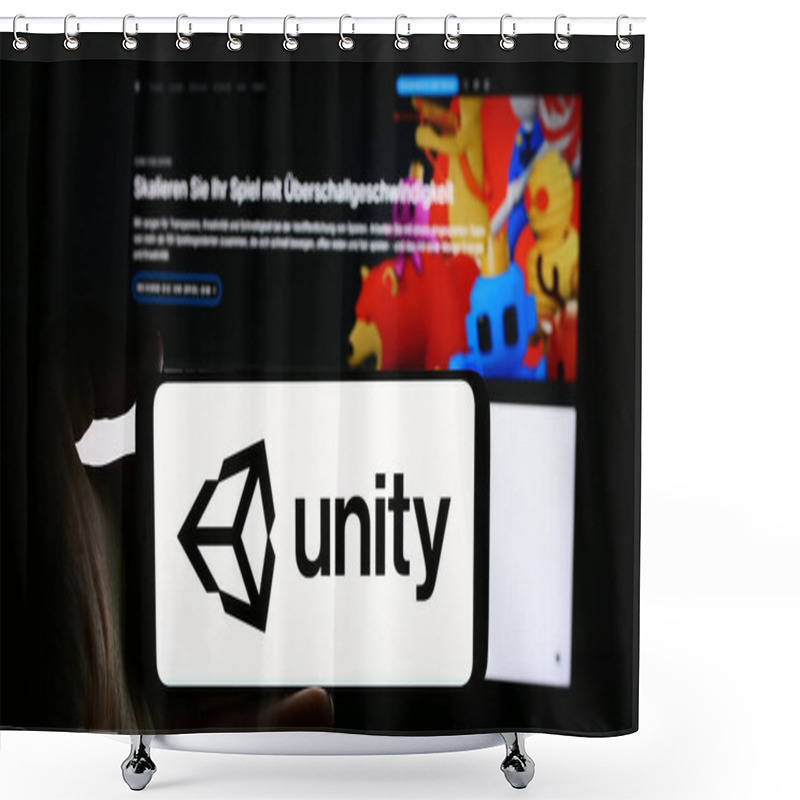 Personality  Stuttgart, Germany - 08-09-2024: Person Holding Cellphone With Logo Of US Video Games Company Unity Software Inc. In Front Of Business Webpage. Focus On Phone Display. Shower Curtains