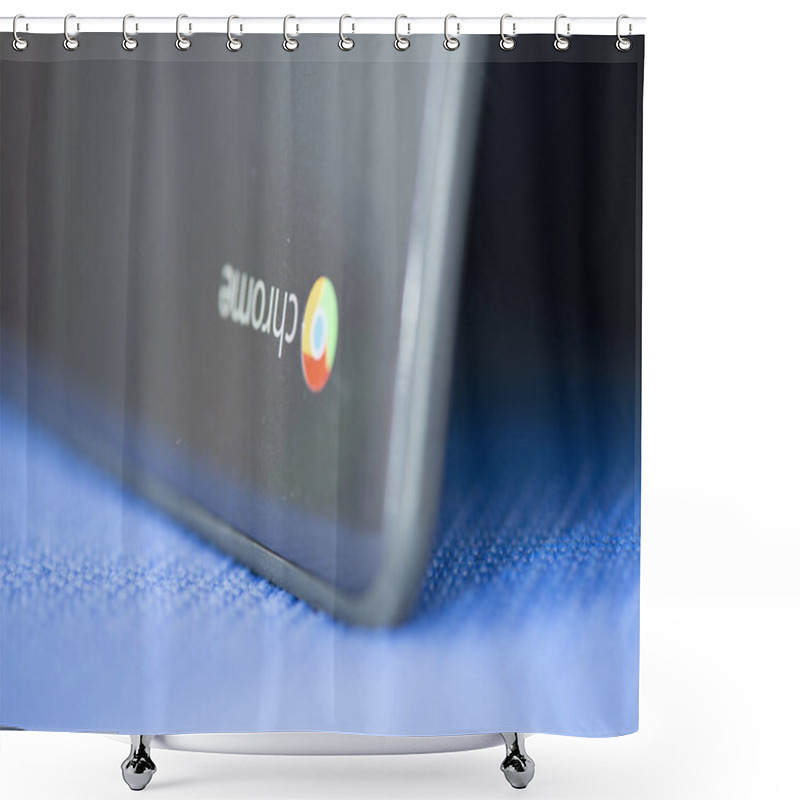 Personality  Elgin, Illinois - Circa 2019: An Dell Ecducational Edition Chromebook Ok A Blue Mat Against A Blurred Background. Shower Curtains