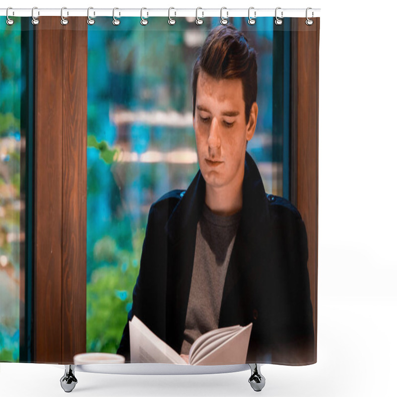 Personality  Young Pensive Handsome Man Reading Book And Drinking Tea Or Coffee On Rainy Day In Cozy Modern Cafe Shower Curtains