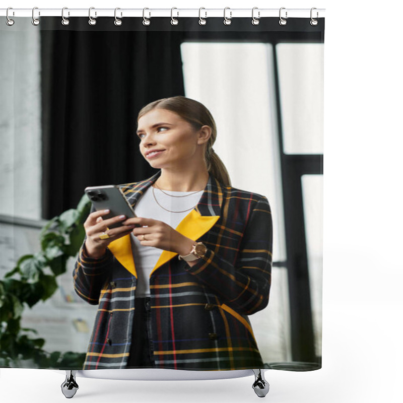 Personality  An Attractive Young Woman In A Chic Checkered Blazer Engages With Her Smartphone While Working. Shower Curtains