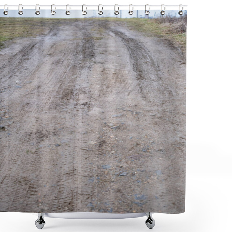 Personality  Close-up View Of A Muddy Dirt Road With Deep Tire Tracks And Scattered Small Rocks. The Rough Texture And Worn Path Suggest Frequent Vehicle Use In A Rural Or Countryside Setting. Shower Curtains