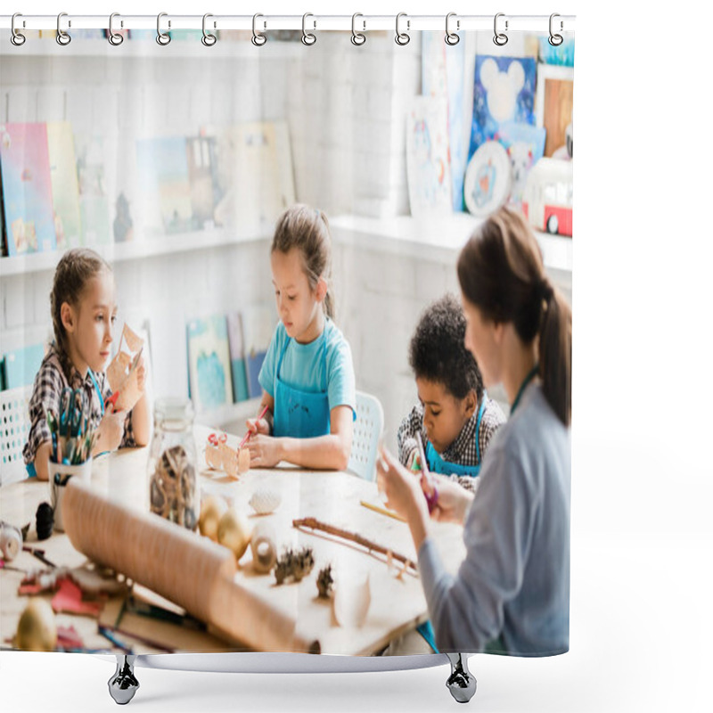 Personality  Group Of Youthful And Clever Schoolkids And Their Teacher Sitting By Table And Making Paper Decorations For Forthcoming Holiday Shower Curtains