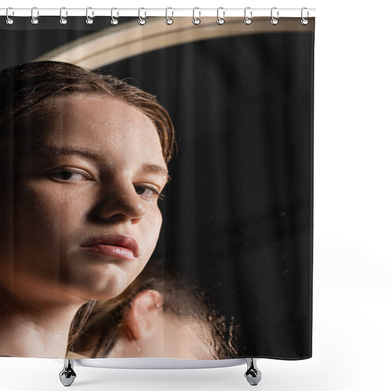 Personality  Young Model With Wet Skin On Face Looking At Camera Near Blurred Mirror  Shower Curtains