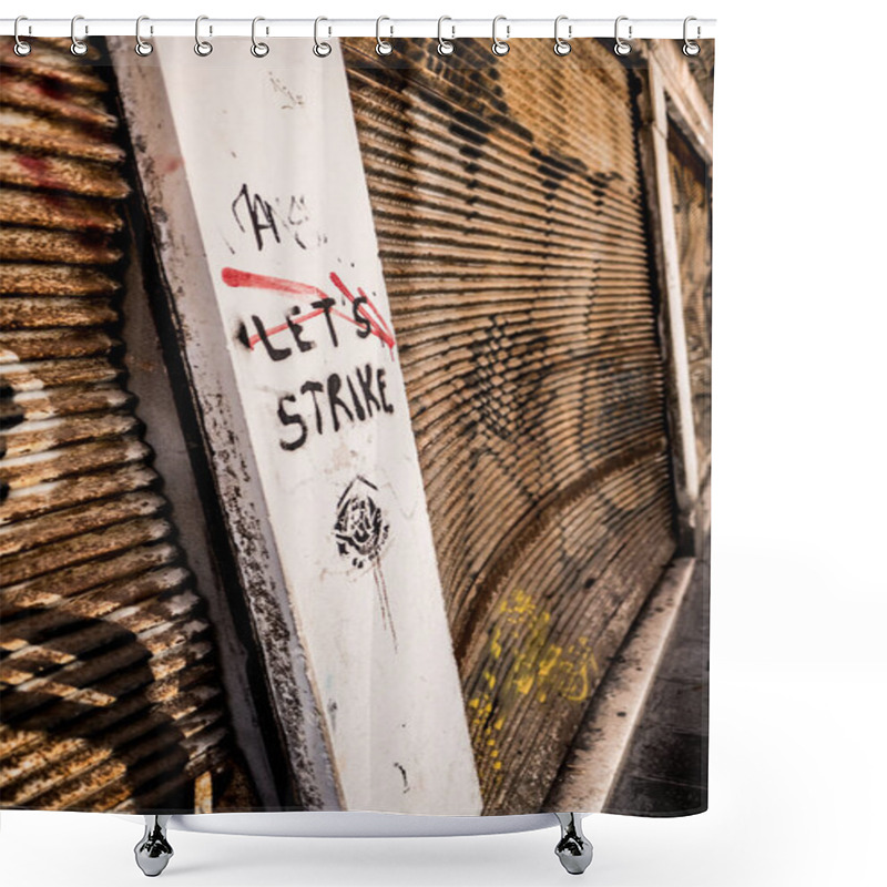 Personality  An Urban Scene From Venice Showcasing Graffiti Art With The Powerful Message 'Let's Strike,' Set Against A Weathered Metal Wall, Embodying Street Art Culture And Protest Expression. Shower Curtains