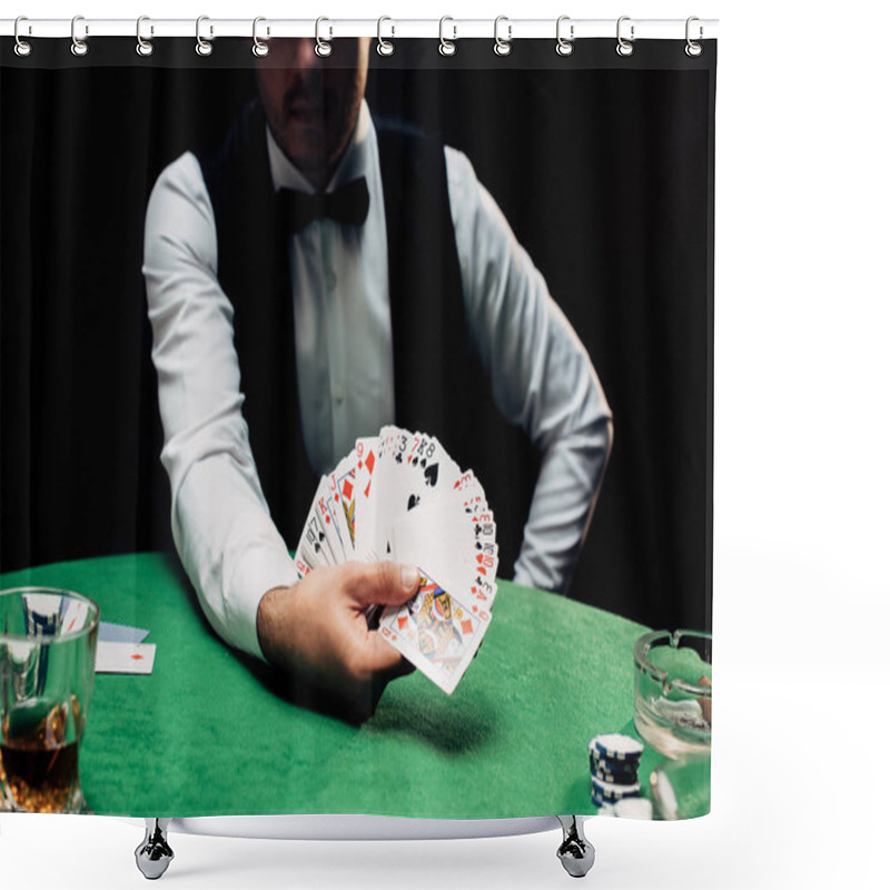 Personality  KYIV, UKRAINE - AUGUST 20, 2019: Cropped View Of Croupier In Formal Wear Holding Playing Cards Near Poker Table Isolated On Black Shower Curtains