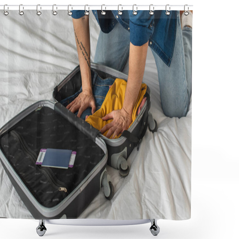 Personality  Cropped View Of Tourist Pressing Clothes In Suitcase Near Passport With Boarding Pass On Bed  Shower Curtains