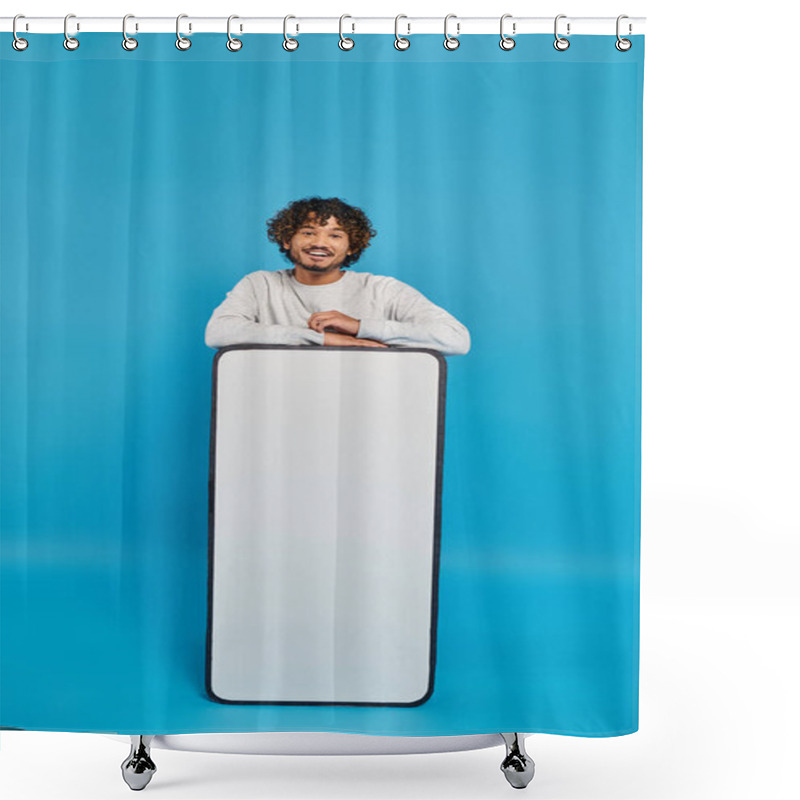 Personality  A Man Stands Hidden Behind A Large White Object In A Studio Setting On A Blue Background. Shower Curtains