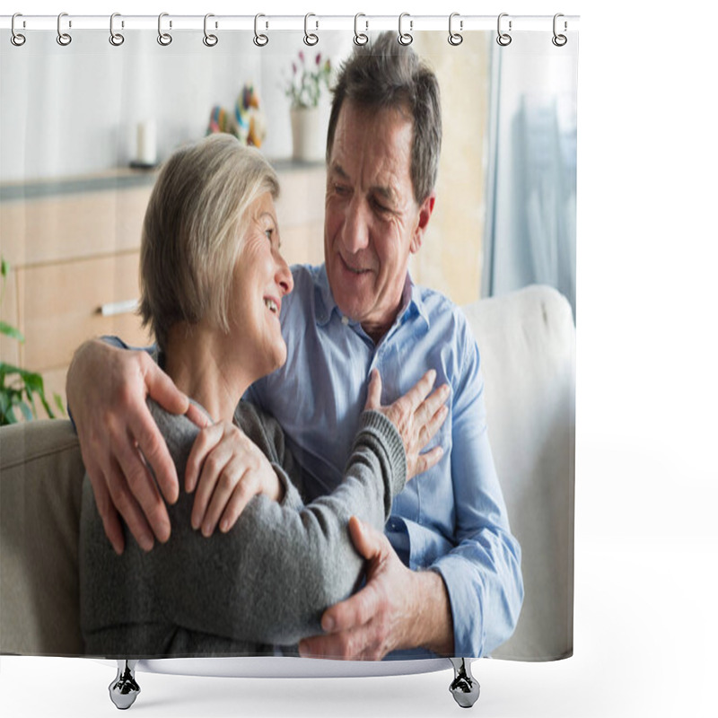 Personality  Senior Couple Sitting On A Couch In Living Room, Hugging Shower Curtains