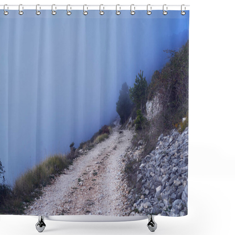 Personality  A Rugged Mountain Trail Disappears Into Thick Fog, Creating An Eerie And Mysterious Atmosphere. The Rocky Path, Surrounded By Sparse Vegetation And Mist, Evokes A Sense Of Adventure, Solitude, And Exploration. Shower Curtains