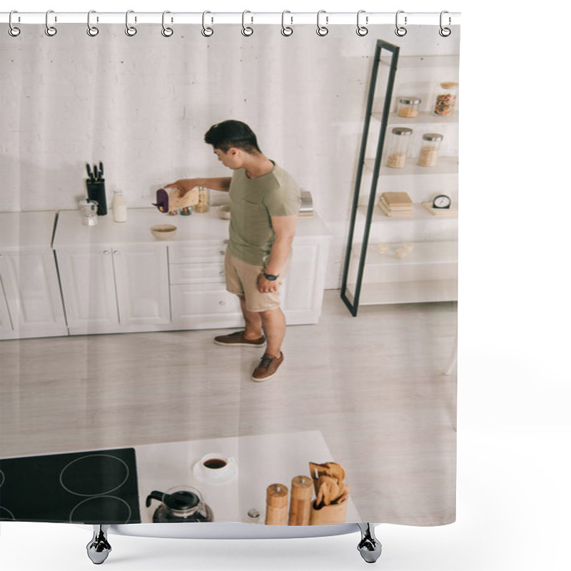 Personality  High Angle View Of Young Man Adding Flakes In Bowl While Standing Near Kitchen Table Shower Curtains