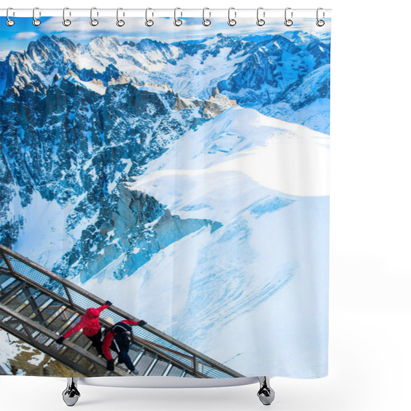 Personality  Two Tourists In Jackets Walk On A Metal Walkway High Above Chamonix, Surrounded By Vast Snowy Mountains. The Sun Shines Brightly On The Peaks Under A Clear Sky. Shower Curtains