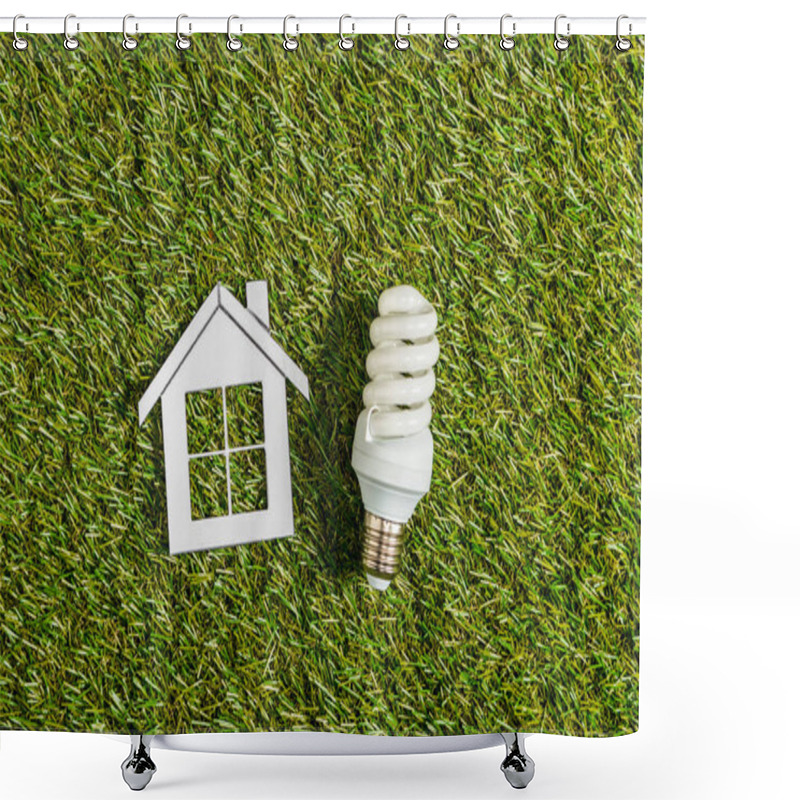 Personality  Top View Of Fluorescent Lamp Near Paper House On Green Grass, Energy Efficiency At Home Concept Shower Curtains