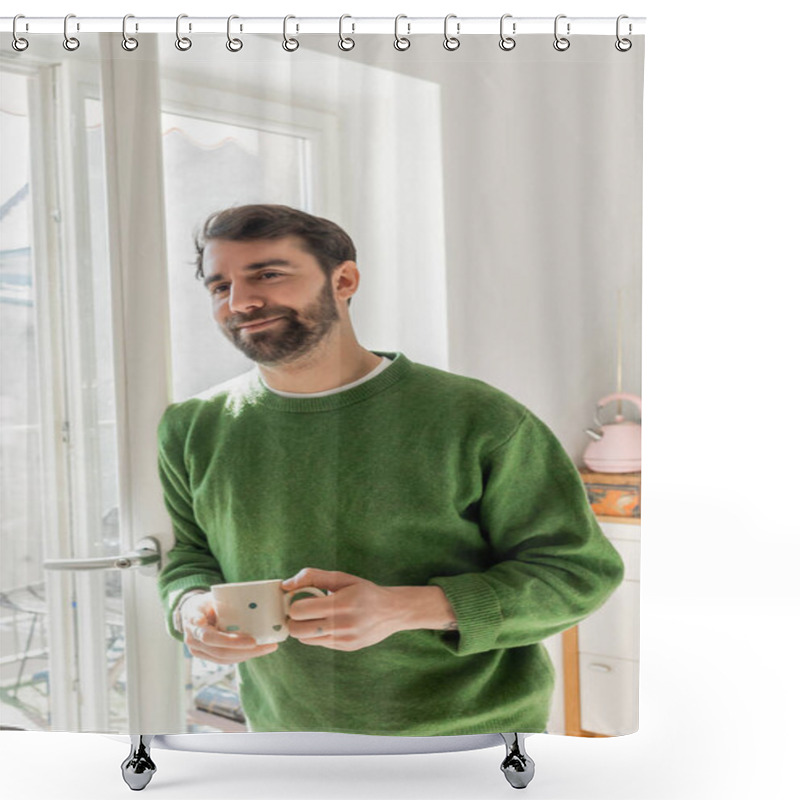 Personality  Positive Bearded And Brunette Man In Green Jumper Holding Cup Of Coffee While Standing Near Window Shower Curtains