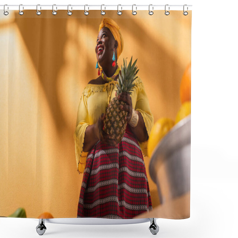 Personality  Low Angle View Of Smiling Middle Aged African American Woman Selling Fruits With Pineapple In Hand On Orange Shower Curtains