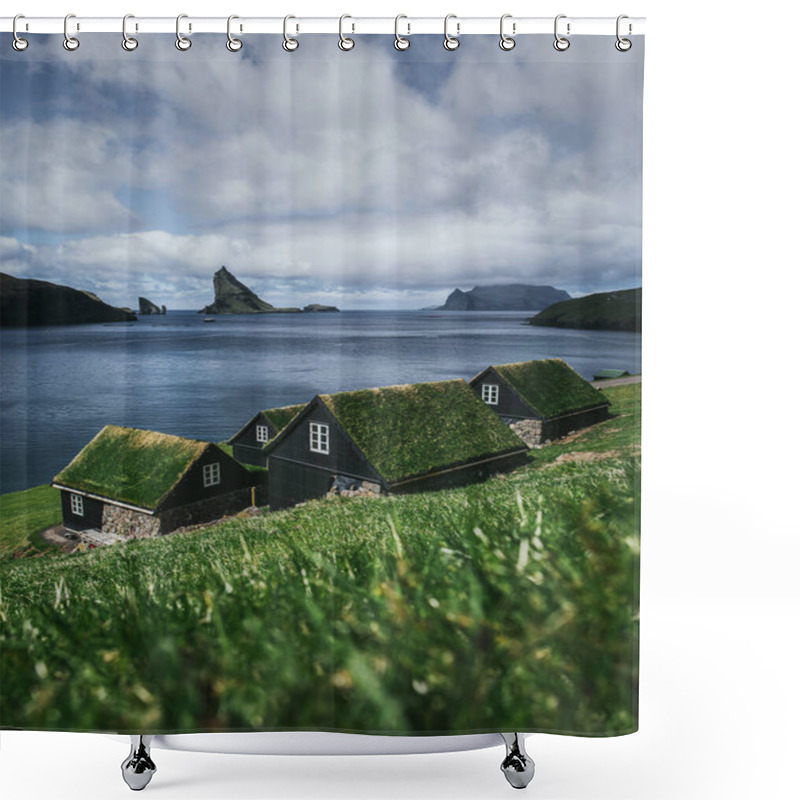 Personality  Black Wooden Houses With A Green Grass Roof. Houses By The Ocean Overlooking The Cliffs Of The Faroe Islands. Beautiful Summer Landscape. Vertical Photo. Shower Curtains