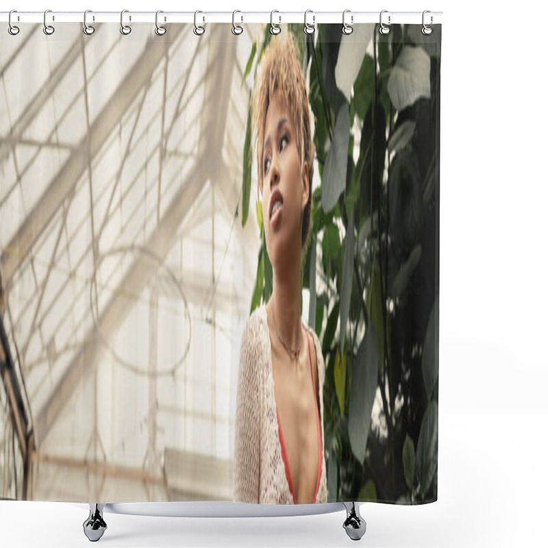 Personality  Low Angle View Of Confident Young African American Woman In Summer Knitted Top Looking Away While Standing Near Plants In Blurred Orangery, Stylish Woman With Tropical Backdrop, Banner  Shower Curtains