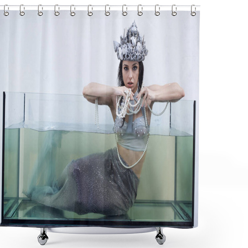 Personality  A Mermaid, Wearing A Silver Crown And Pearl Necklace, Leans Against The Edge Of A Glass Tank, Her Tail Disappearing Into The Water. Shower Curtains