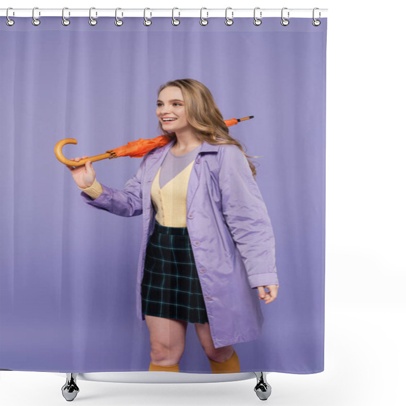 Personality  Positive Young Woman In Trench Coat Standing With Orange Umbrella Isolated On Purple  Shower Curtains