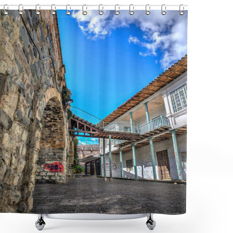 Personality  Old House In Front Of The Ancient And Famous Stone Puente Roto, Or Broken Bridge, On A Sunny Afternoon, Cuenca, Ecuador. Shower Curtains